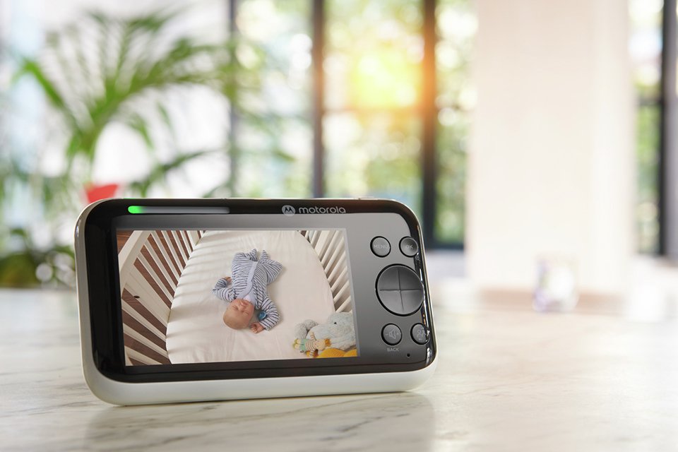 A close up image of Motorola PIP1500 5'' Video Baby Monitor placed on a kitchen counter.